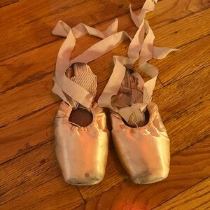 Well worn ballet shoes